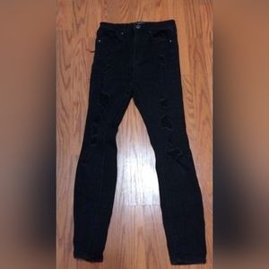 Black Denham jeans with rippes